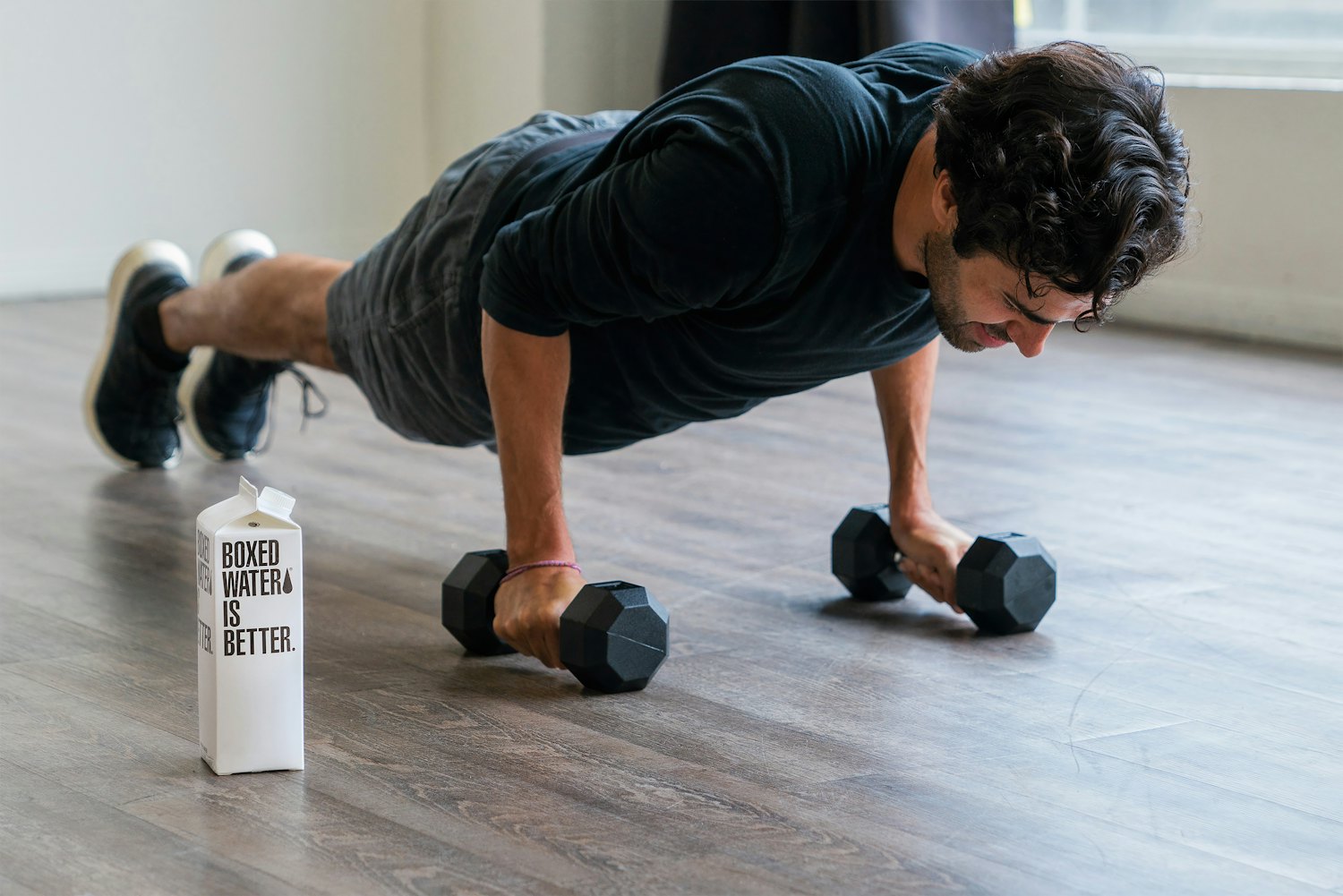 A dumbbell press performed on the floor